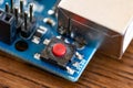 Micro controller close-up, RESET button detail. Open source microcontroller for DIY projects. Stem activities with electronics