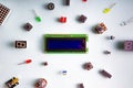 Micro electronics arduino DIY components on a light background, top view