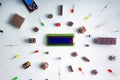 Micro electronics arduino DIY components on a light background, top view