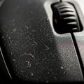 The micro texture of the mouse showing wear and the accumulation Royalty Free Stock Photo