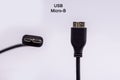 Micro USB type B cable from different angles isolated against white background. External Hard disk connector cable Royalty Free Stock Photo