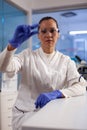 Microbiologist doctor looking at medical slice analyzing blood smaple Royalty Free Stock Photo