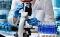 Microscopist scientist working with micro samples in the microbiology lab Royalty Free Stock Photo