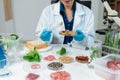 Microbiologists and nutrition experts analyze molecular samples in advanced food science labs Royalty Free Stock Photo