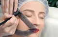 Microblading. Permanent makeup. Attractive woman getting facial care and tattoo Royalty Free Stock Photo