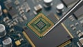 Microchip Installation on Circuit Board Royalty Free Stock Photo