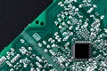 Microchip integrated on green motherboard computer science Royalty Free Stock Photo