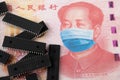 Microchips shortage in China because of COVID-19 pandemic. Concept. Picture of computer chips placed on banknote