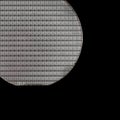 A microcircuit of a powerful Darlington transistor on a cut scribed semiconductor silicon multilayer wafer