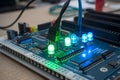 Microcontroller Board with Glowing LEDs â Tech Development Concept Royalty Free Stock Photo
