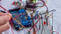 Microcontroller build closeup showing components, board and shield Royalty Free Stock Photo