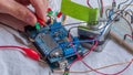 Microcontroller build closeup showing components, board and shield Royalty Free Stock Photo