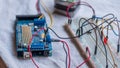 Microcontroller build closeup showing components, board and shield Royalty Free Stock Photo