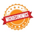 MICROECONOMICS text on red orange ribbon stamp