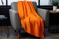 microfiber blanket draped over a modern chair