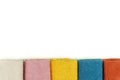 Microfiber cleaning cloth. Isolated.Colored microfiber cloths, lying in a row. Royalty Free Stock Photo