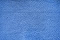 Microfiber towel blue terry texture swatch. Fabric texture background. Cleaning service. Macro object Royalty Free Stock Photo