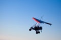 Microlight aircraft in silhouette