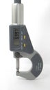 A  micrometer with a digital display,Located on white background,Easy to use in any work Royalty Free Stock Photo