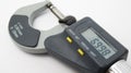 A  micrometer with a digital display,Located on white background,Easy to use in any work Royalty Free Stock Photo