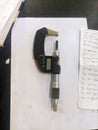 Micrometer on paper