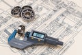 Micrometer screw gauge. Ball bearings. Drawing on background Royalty Free Stock Photo