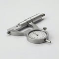 The micrometer on a white background. Measuring tool. Royalty Free Stock Photo