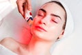 Microneedle facial mesotherapy with red light