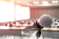 Microphone on abstract blurred of speech in seminar room