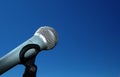 Microphone against blue sky Royalty Free Stock Photo