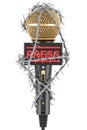 Microphone with barbed wire. Freedom of the press prohibition concept. 3D rendering Royalty Free Stock Photo