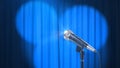 Microphone and a Blue Curtain with Spotlights, 3d Render Royalty Free Stock Photo