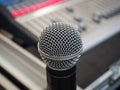 Microphone on the blur sound mixer background. Royalty Free Stock Photo