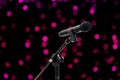 Microphone close up shot on blurred bokeh Purple Pink background beautiful romantic Royalty Free Stock Photo