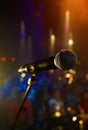 Microphone, Closeup And Stage Performance In Theater With Sound Equipment For Concert Or Singing. Audio, Technology And