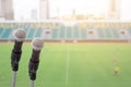 Microphone for commentator with sport football field Royalty Free Stock Photo