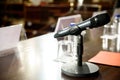 Microphone in conference room to communicate to the audience a business speech Royalty Free Stock Photo