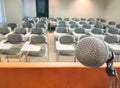 Microphone in Conference Seminar room Event and Meeting Background Royalty Free Stock Photo