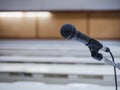 Microphone in Conference Seminar room Meeting Event Background Royalty Free Stock Photo