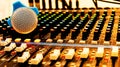 Microphone on console sound board mixer Royalty Free Stock Photo