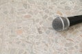 Microphone dynamic on floor marble polished stone background Royalty Free Stock Photo