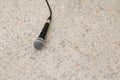 Microphone dynamic on floor marble polished stone background Royalty Free Stock Photo