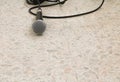 Microphone dynamic on floor marble polished stone background Royalty Free Stock Photo