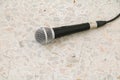 Microphone dynamic on floor marble polished stone background Royalty Free Stock Photo