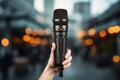 A microphone empowers a journalist\'s front view, making stories resonate powerfully.