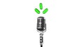 Microphone with floating green capsules Royalty Free Stock Photo