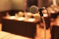 Microphone in front of meeting room empty chairs before the conference Royalty Free Stock Photo