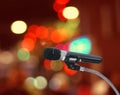 Microphone in hall with lights in background. Royalty Free Stock Photo