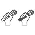 Microphone in hand line and solid icon, sound design concept, hand holding mic vector sign on white background, outline Royalty Free Stock Photo