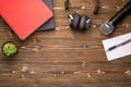 Microphone, headphone, book and paper note on brown wooden board. Learning about speaking concept Royalty Free Stock Photo